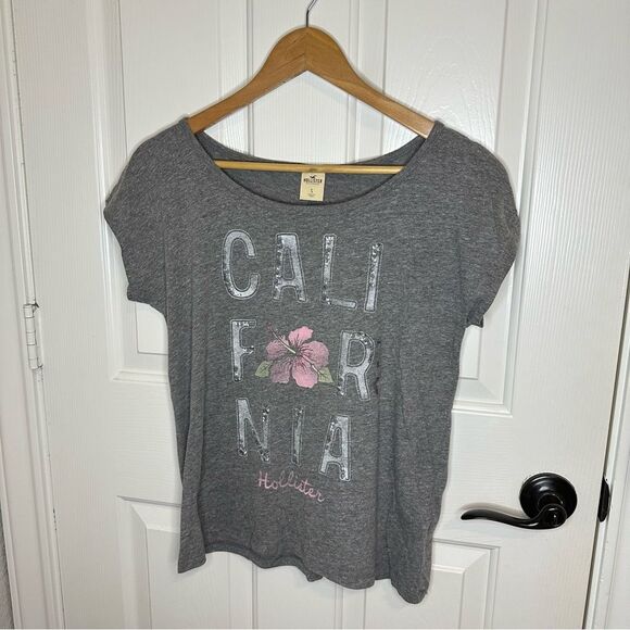 BNWT Y2K Hollister Grey Logo Spell Out Hibiscus Bling Graphic Tee Sz S Mermaid - Picture 1 of 7